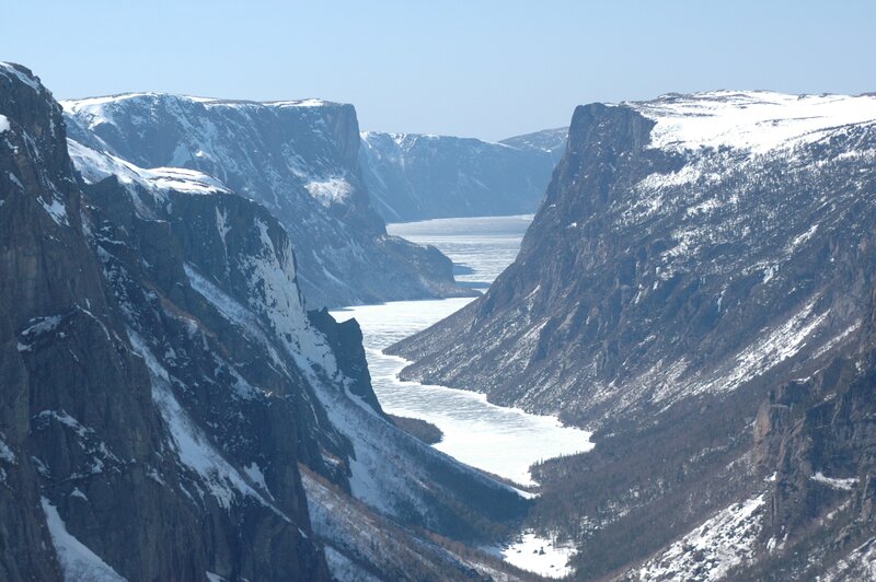frozen river in mountain canyon