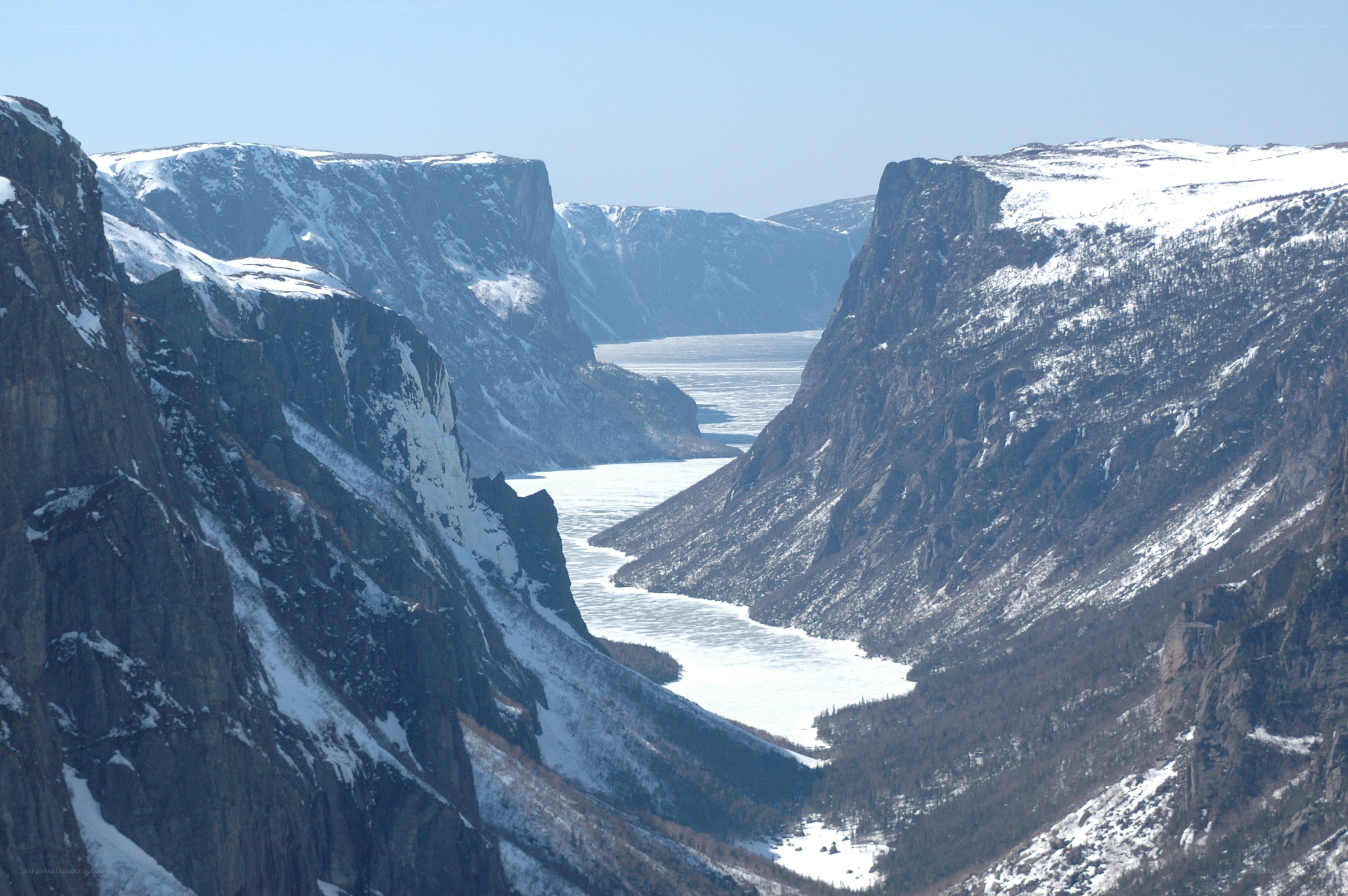 frozen river in mountain canyon