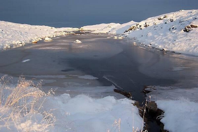 Frozen River in Snow