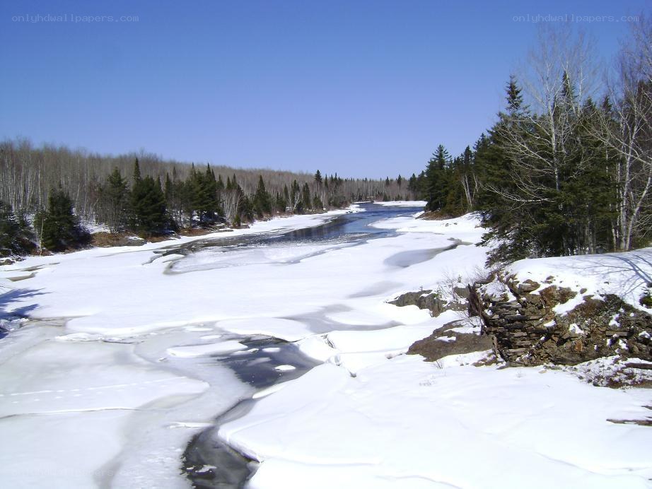 frozen river in winter landscape