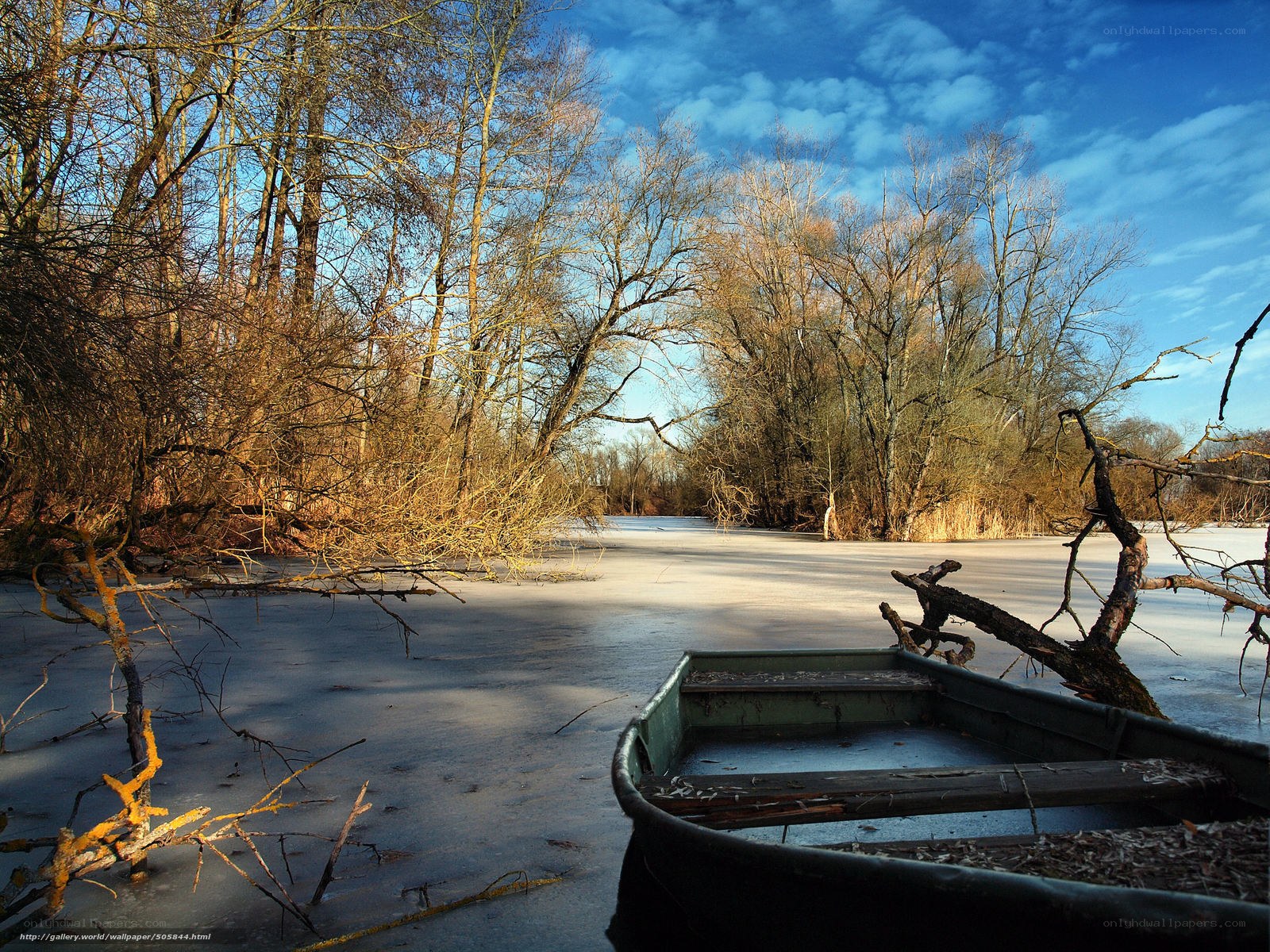 Frozen river with boat