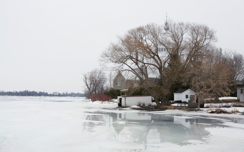 Frozen River with Church