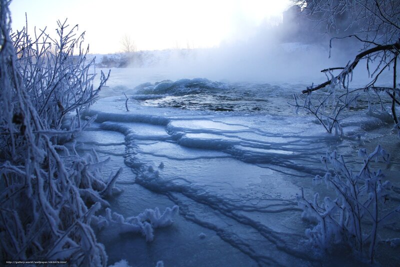 Frozen river with steam