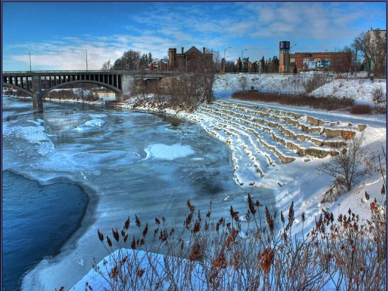 Frozen river with stone steps