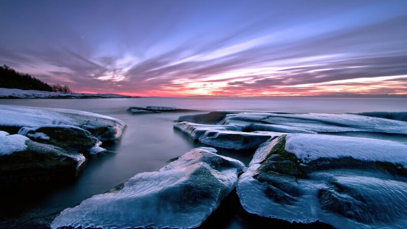 frozen rocks at sunset