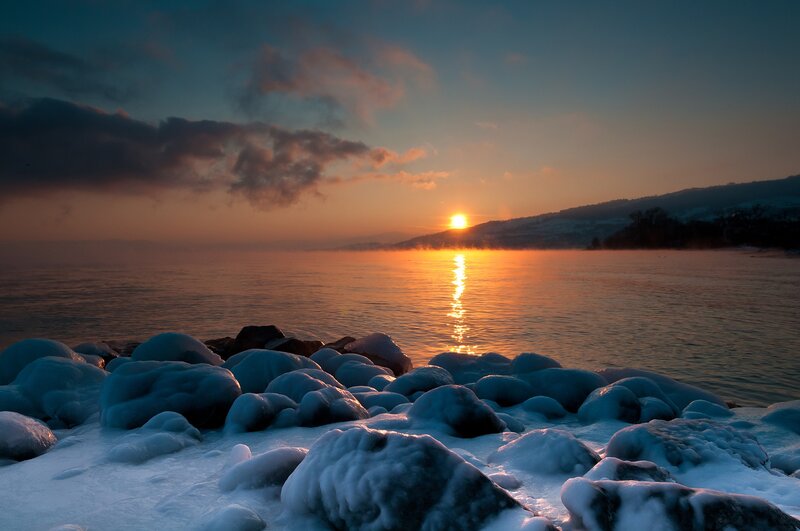 Frozen Rocks at Sunset — Blue, Serene, Photograph, Sun