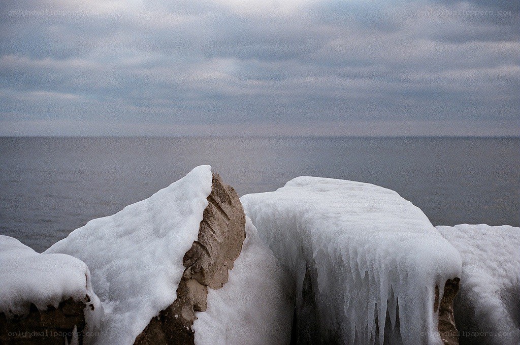 Frozen rocks by the sea