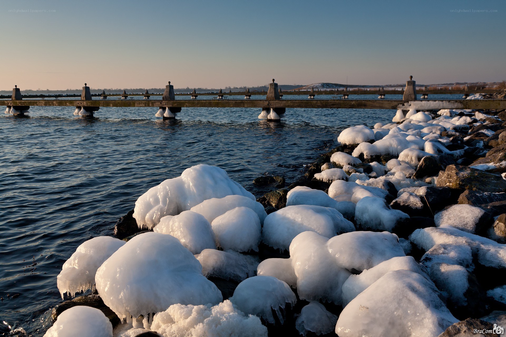 Frozen rocks by the water