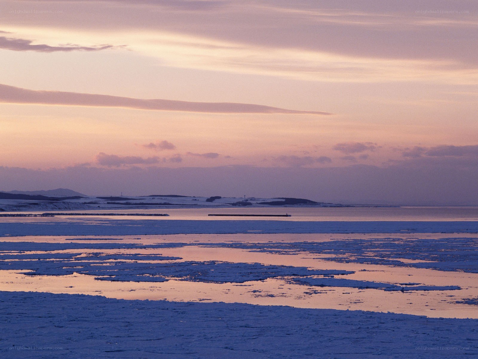 Frozen sea at sunset