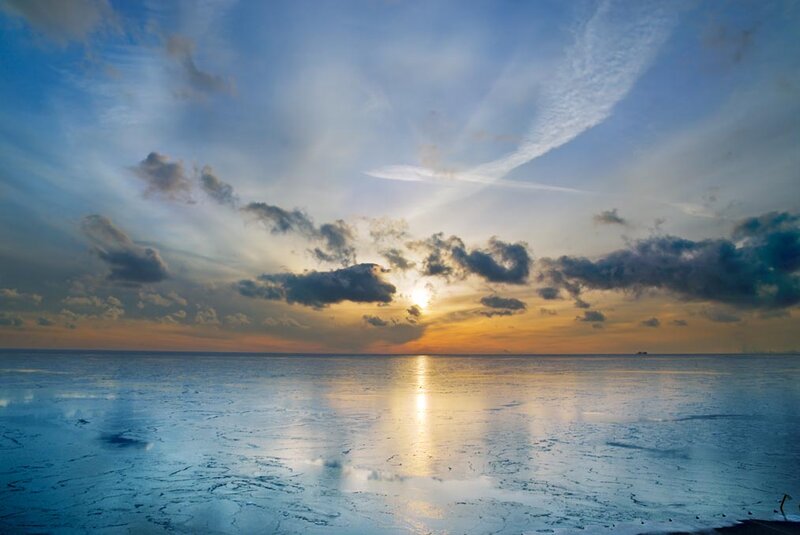 Frozen Sea at Sunset — Blue