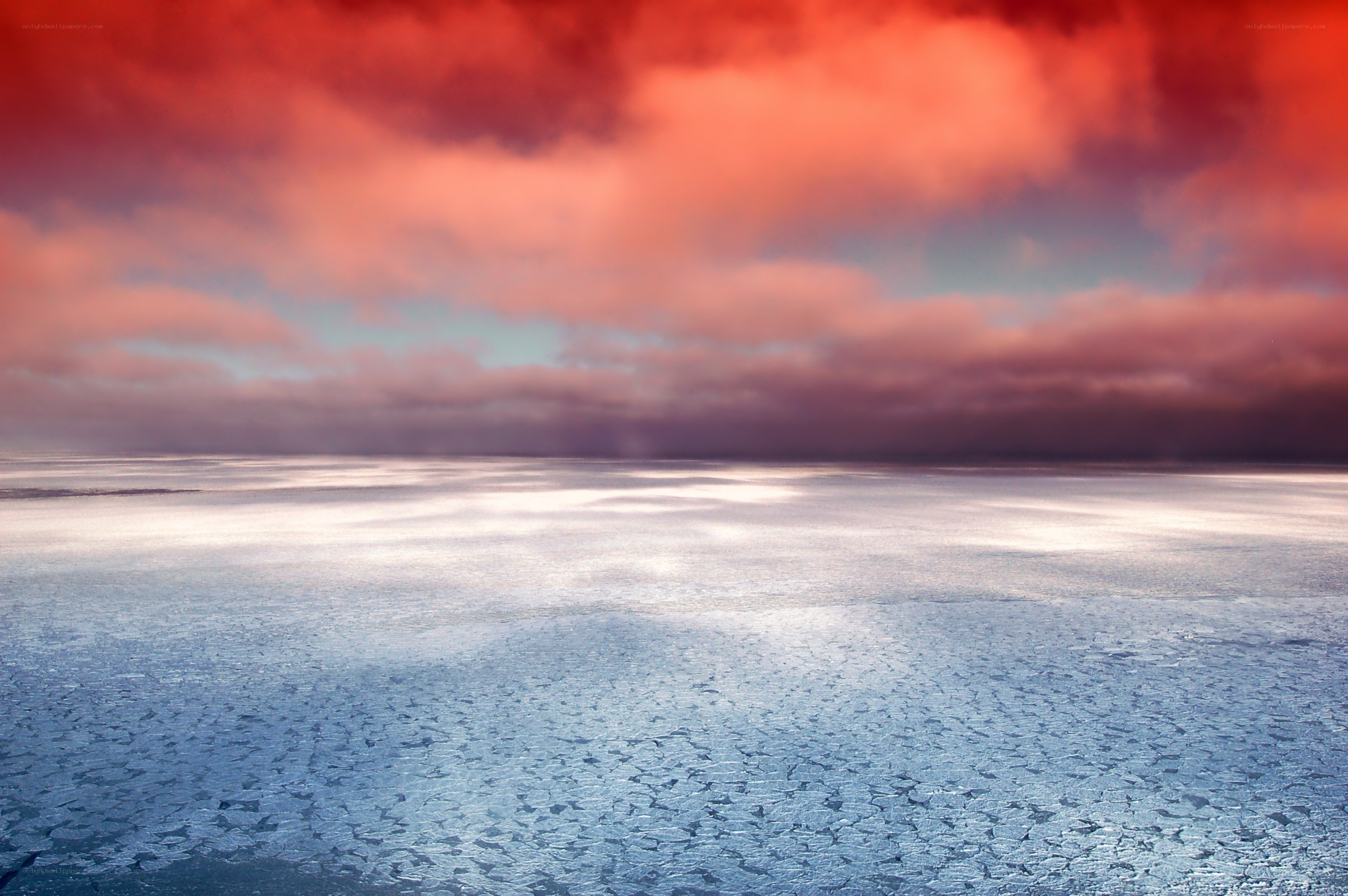 Frozen sea under red sky