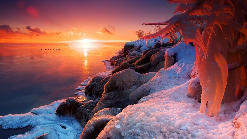 Frozen Shoreline at Sunset — Orange, Dramatic, Photograph, Ice