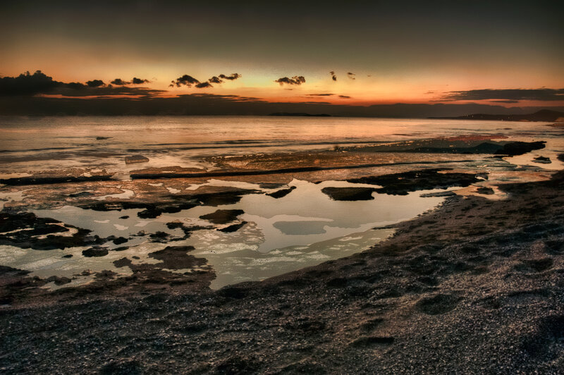 Frozen Shoreline at Sunset — Orange