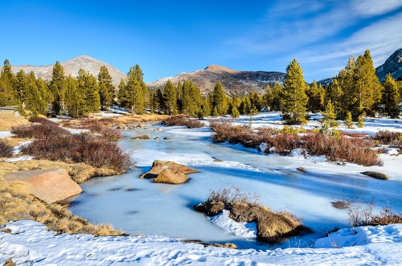 Frozen Stream in Mountains