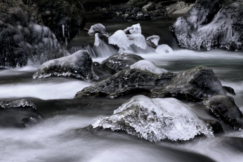 Frozen stream with ice formations