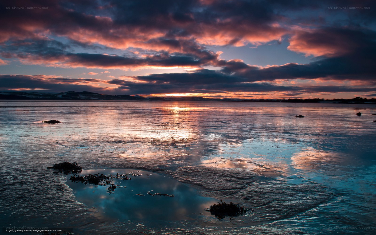 Frozen sunset over a calm sea
