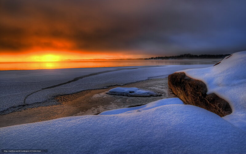 Frozen sunset over icy shore