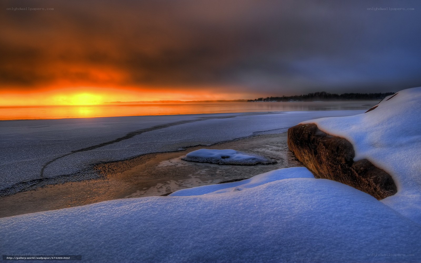 Frozen sunset over icy shore