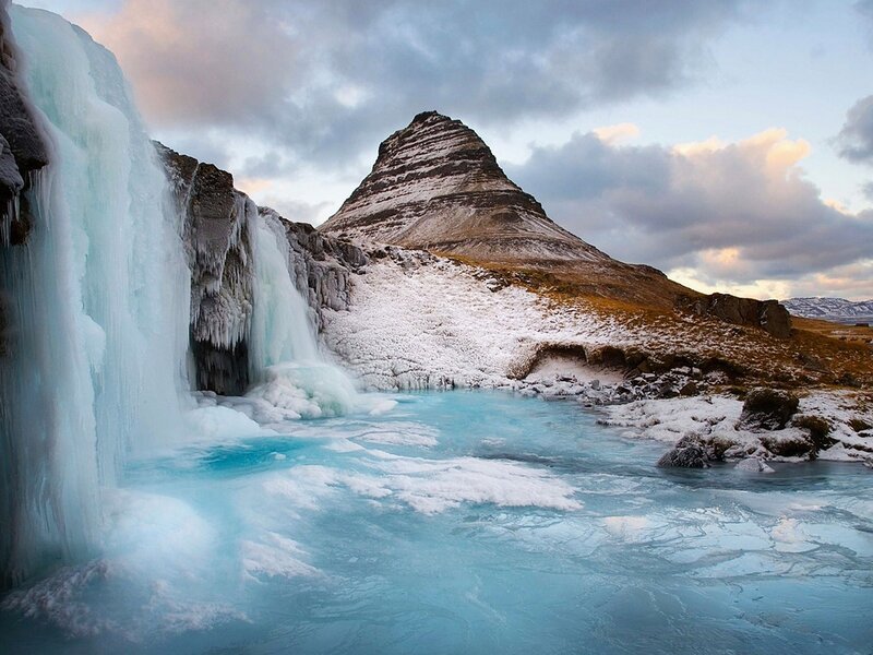Frozen waterfall and mountain