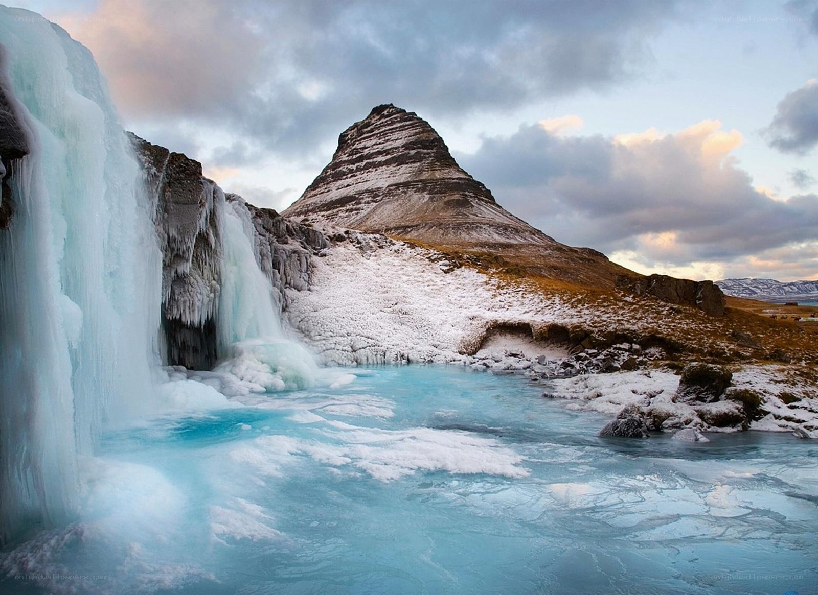 Frozen waterfall and mountain