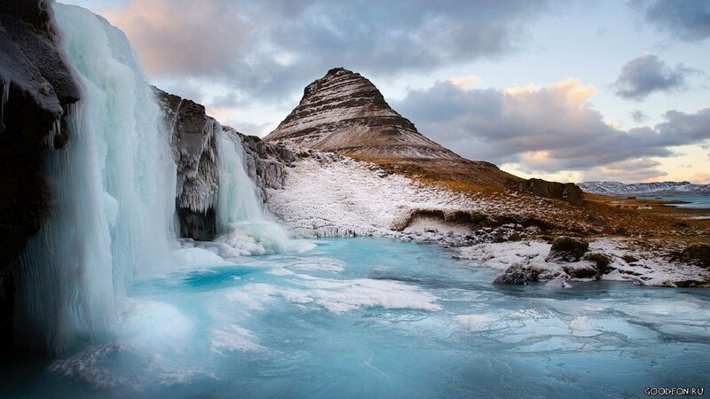 Frozen waterfall and mountain