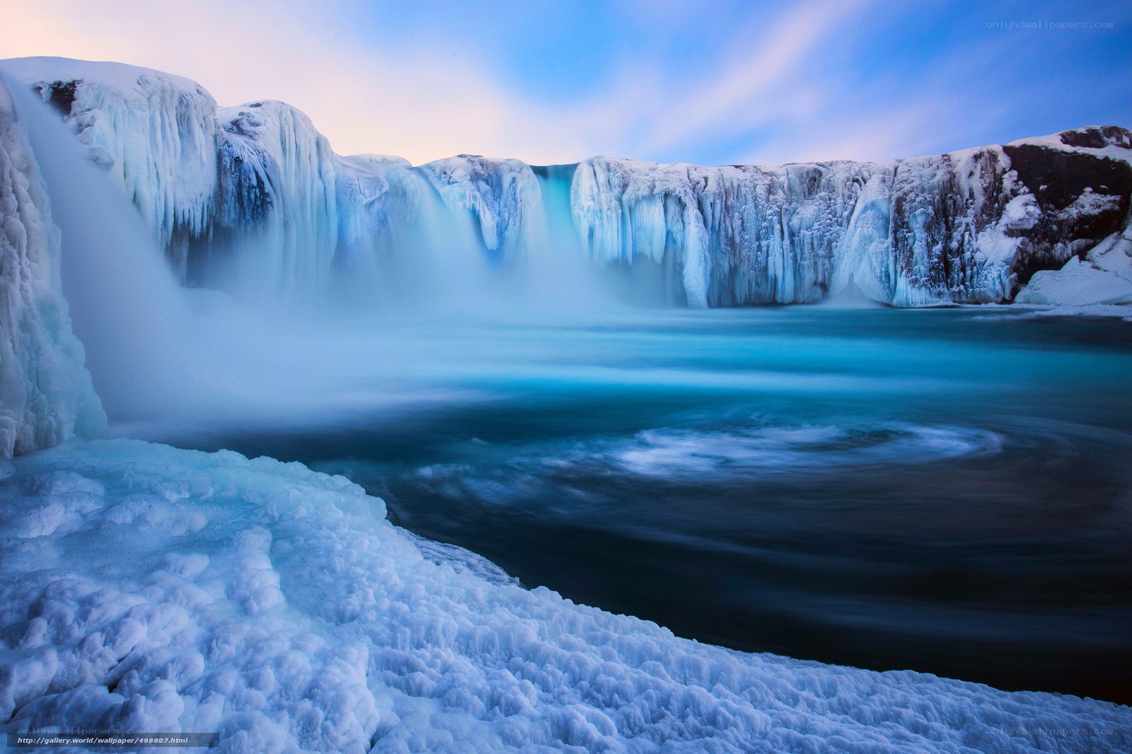 Frozen waterfall at dusk