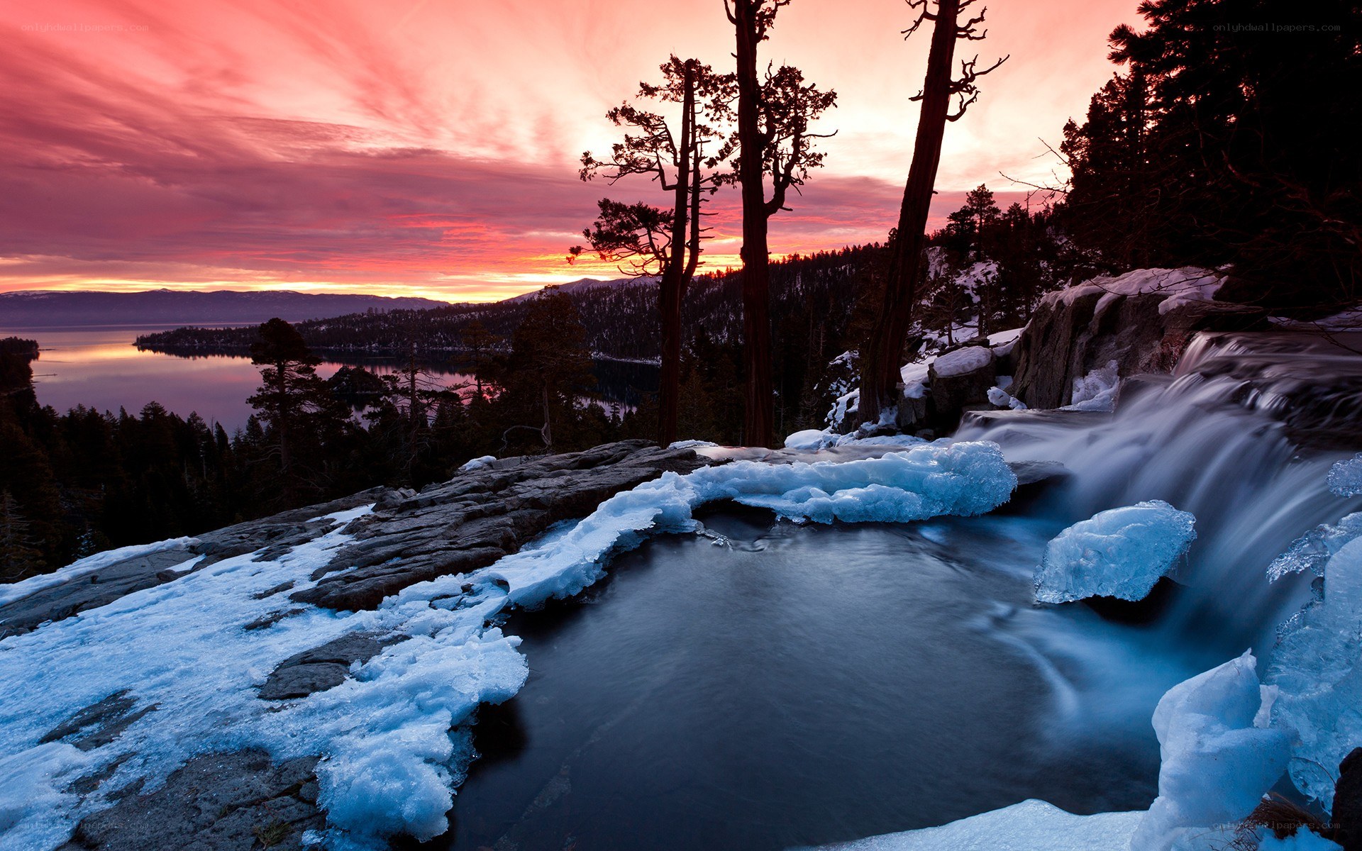 Frozen waterfall at sunset