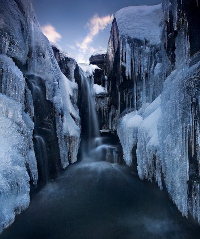 Frozen waterfall in a canyon