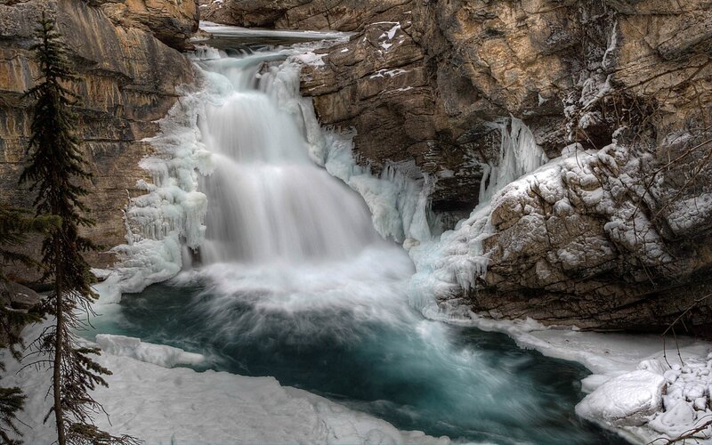 Frozen Waterfall in Canyon — White, Dramatic