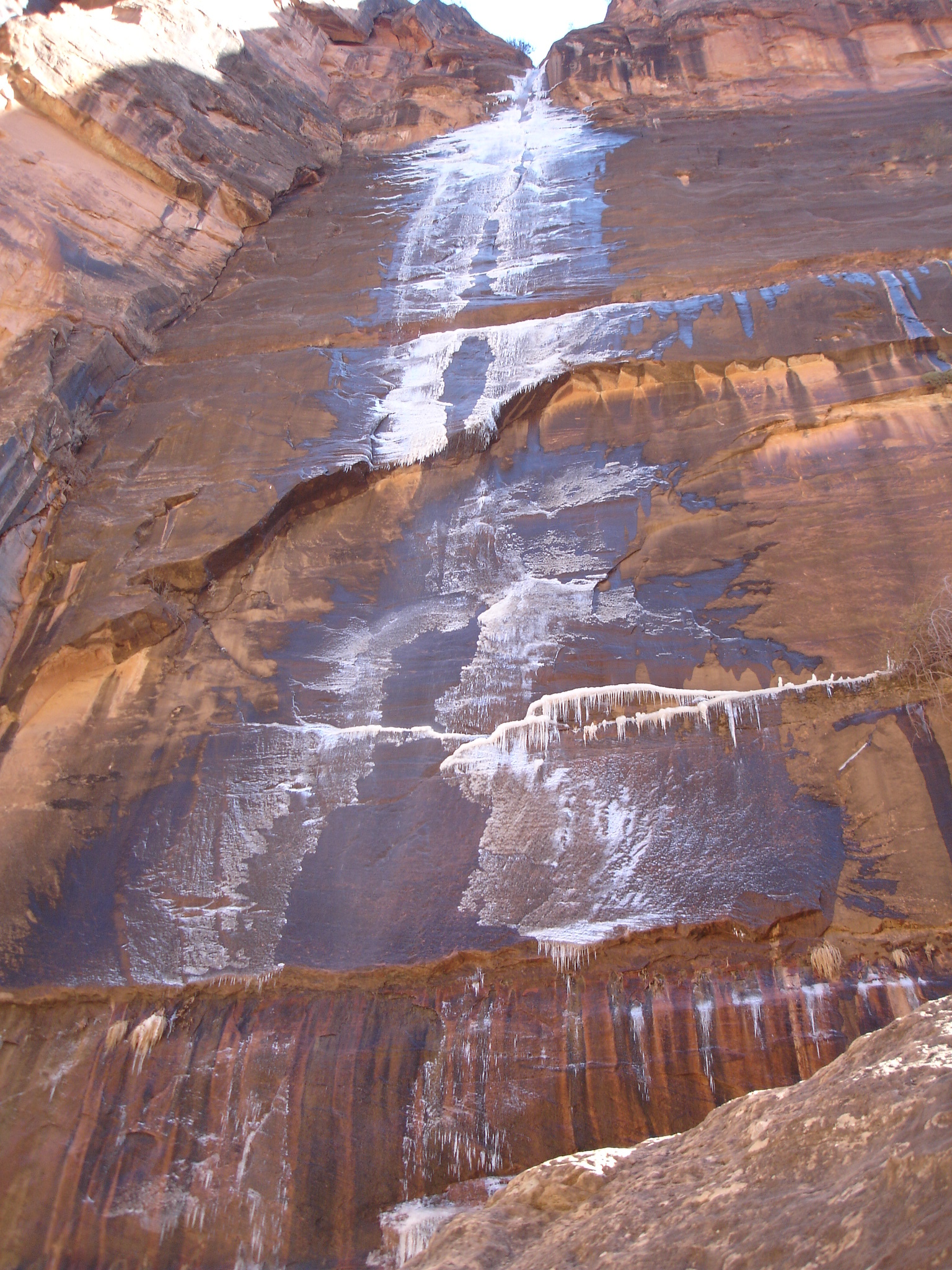 Frozen waterfall in canyon
