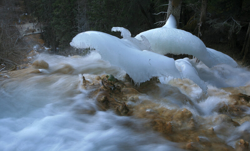 Frozen waterfall in forest