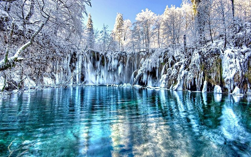 Frozen Waterfall in Forest — Blue, Serene, Winter, Photograph