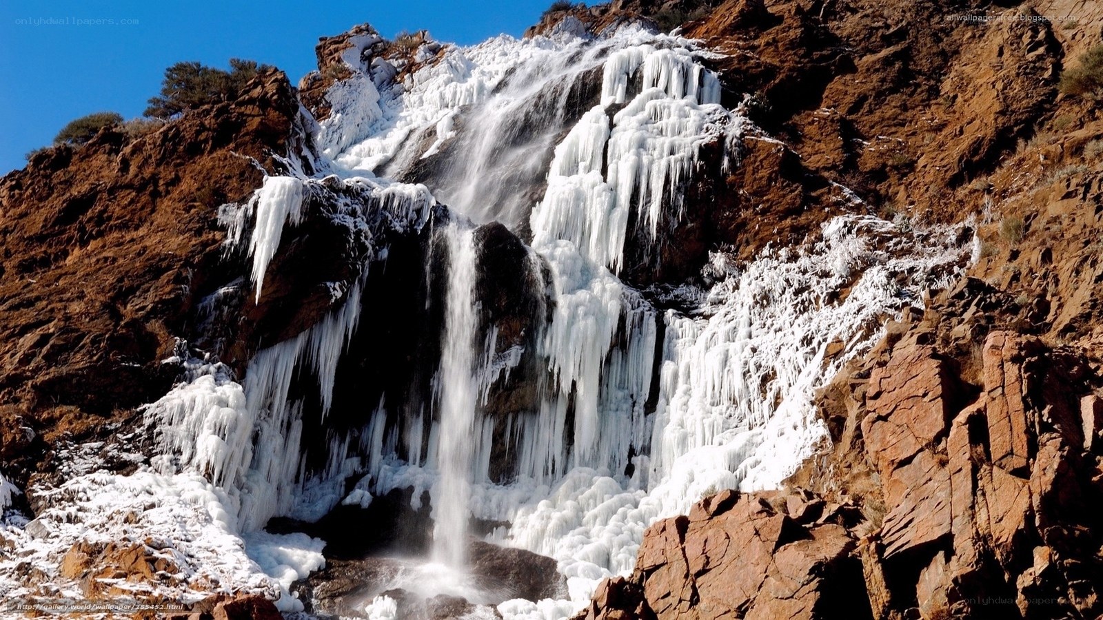 Frozen waterfall in rocky canyon