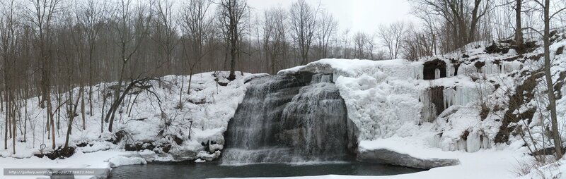 Frozen waterfall in winter forest