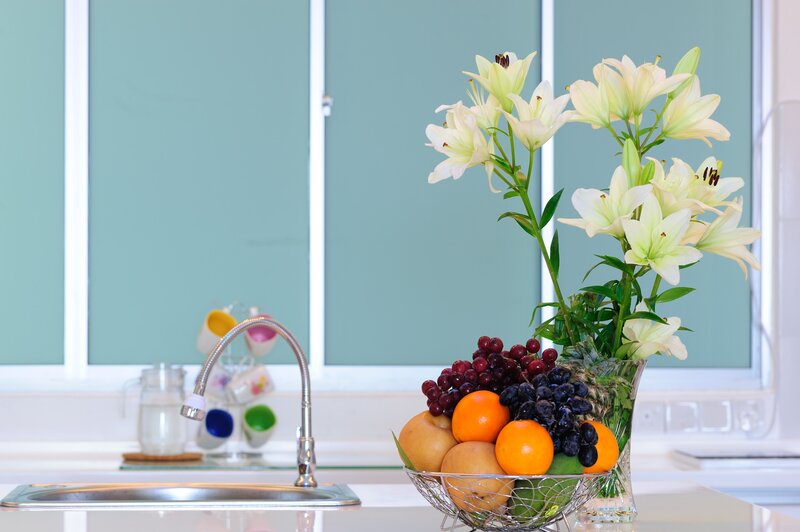 Fruit and Flowers on Counter