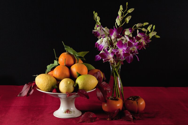 Fruit and Flowers on Table — Red, Dramatic, Photograph