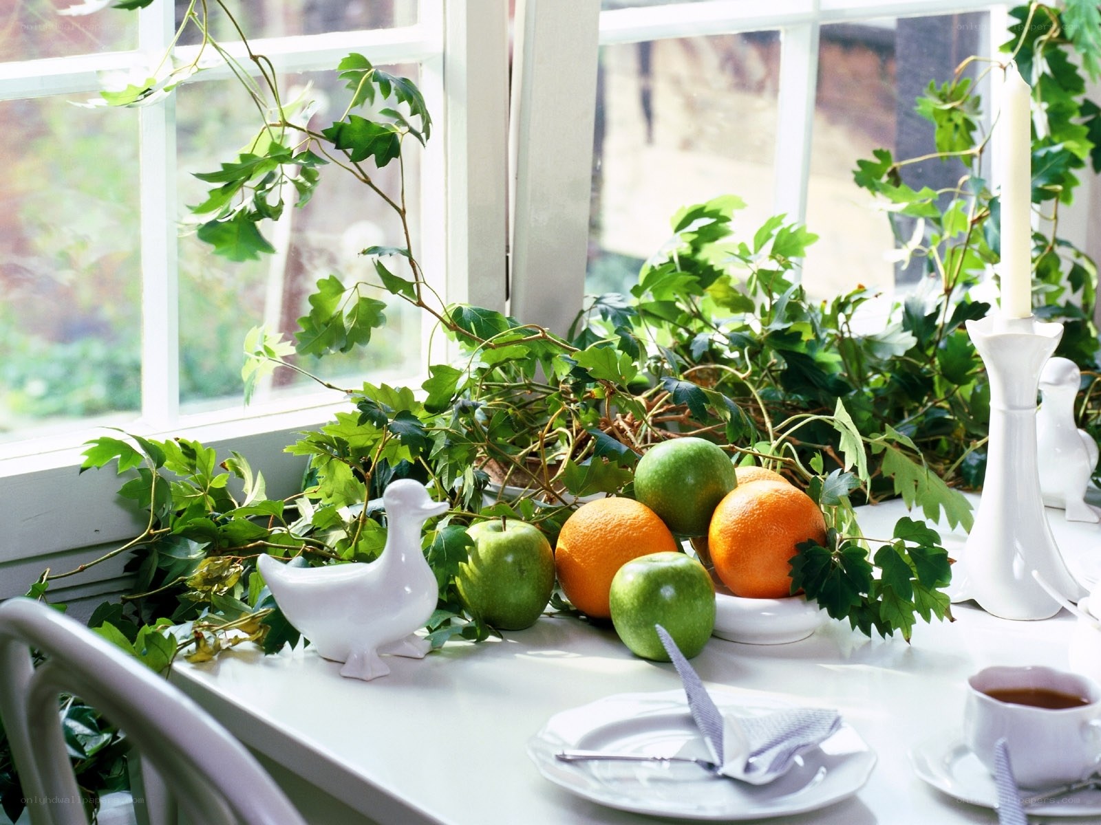Fruit and greenery on a windowsill