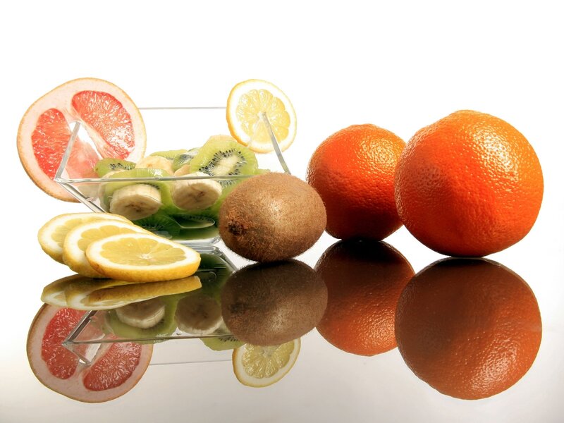 Fruit Arrangement on Reflective Surface