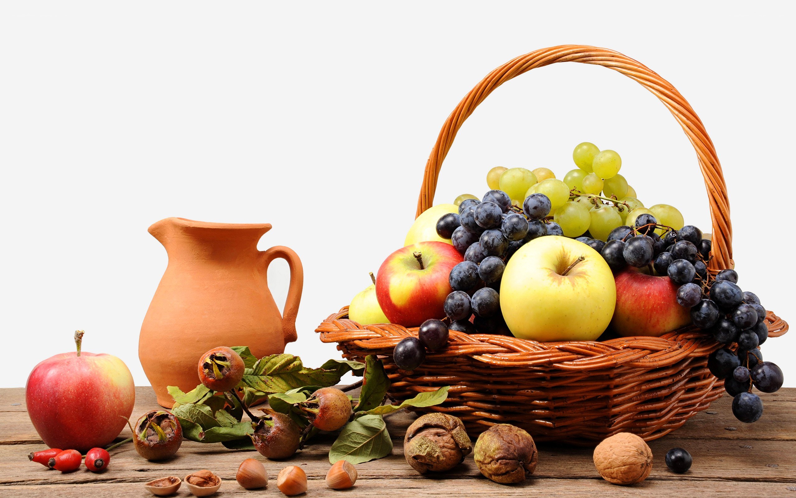 Fruit basket with apples and grapes