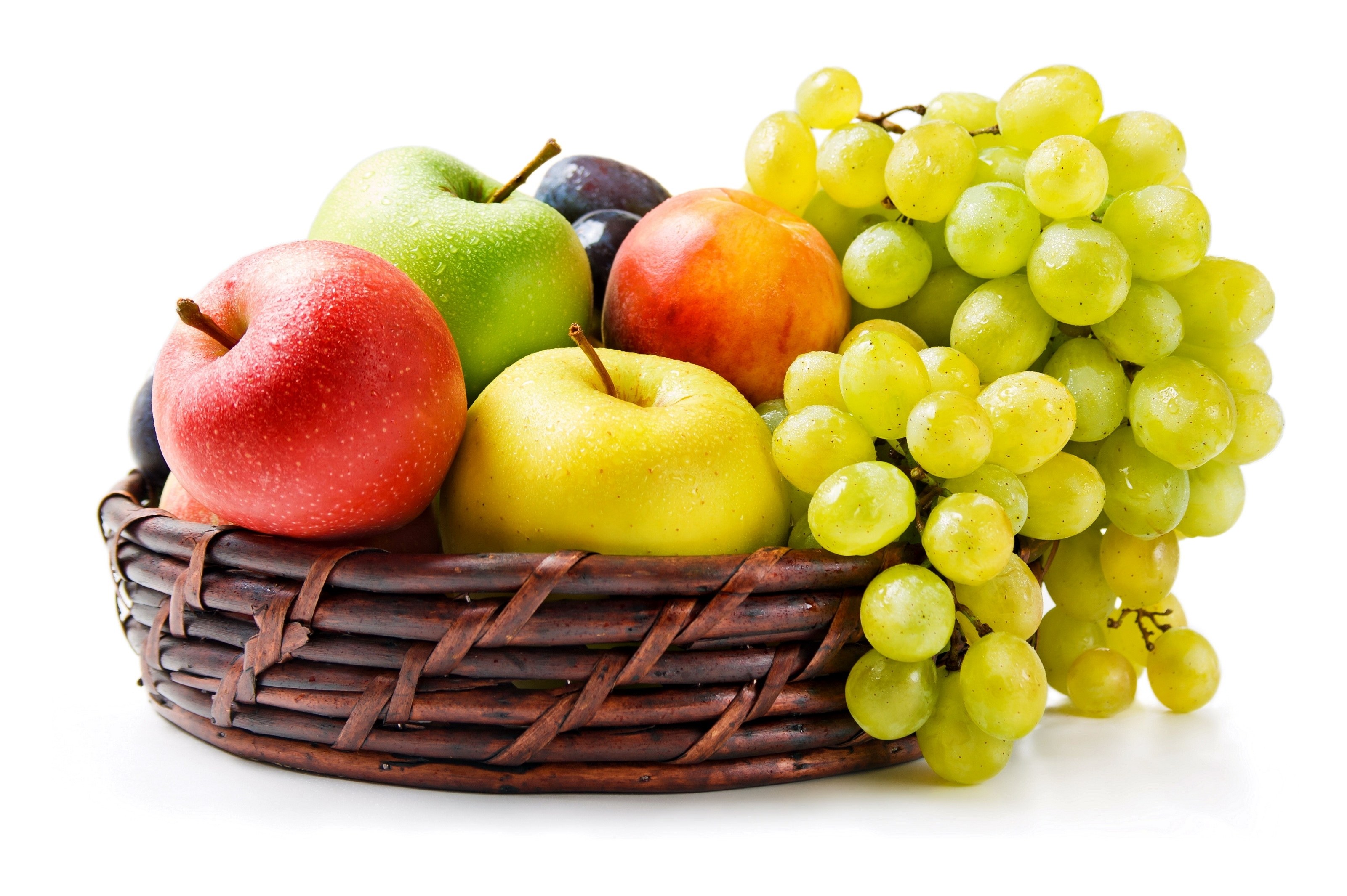fruit basket with apples and grapes