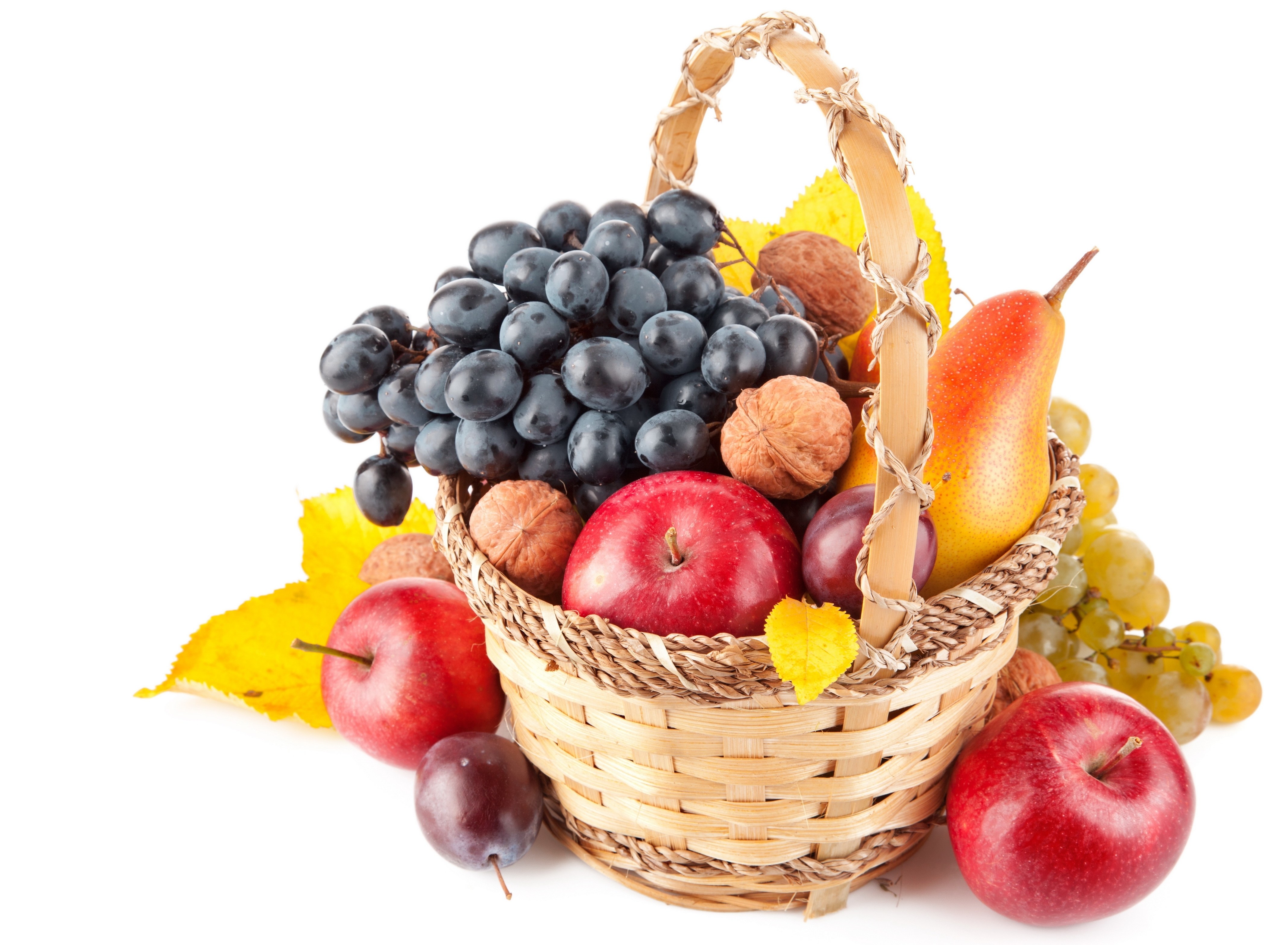 fruit basket with autumn leaves