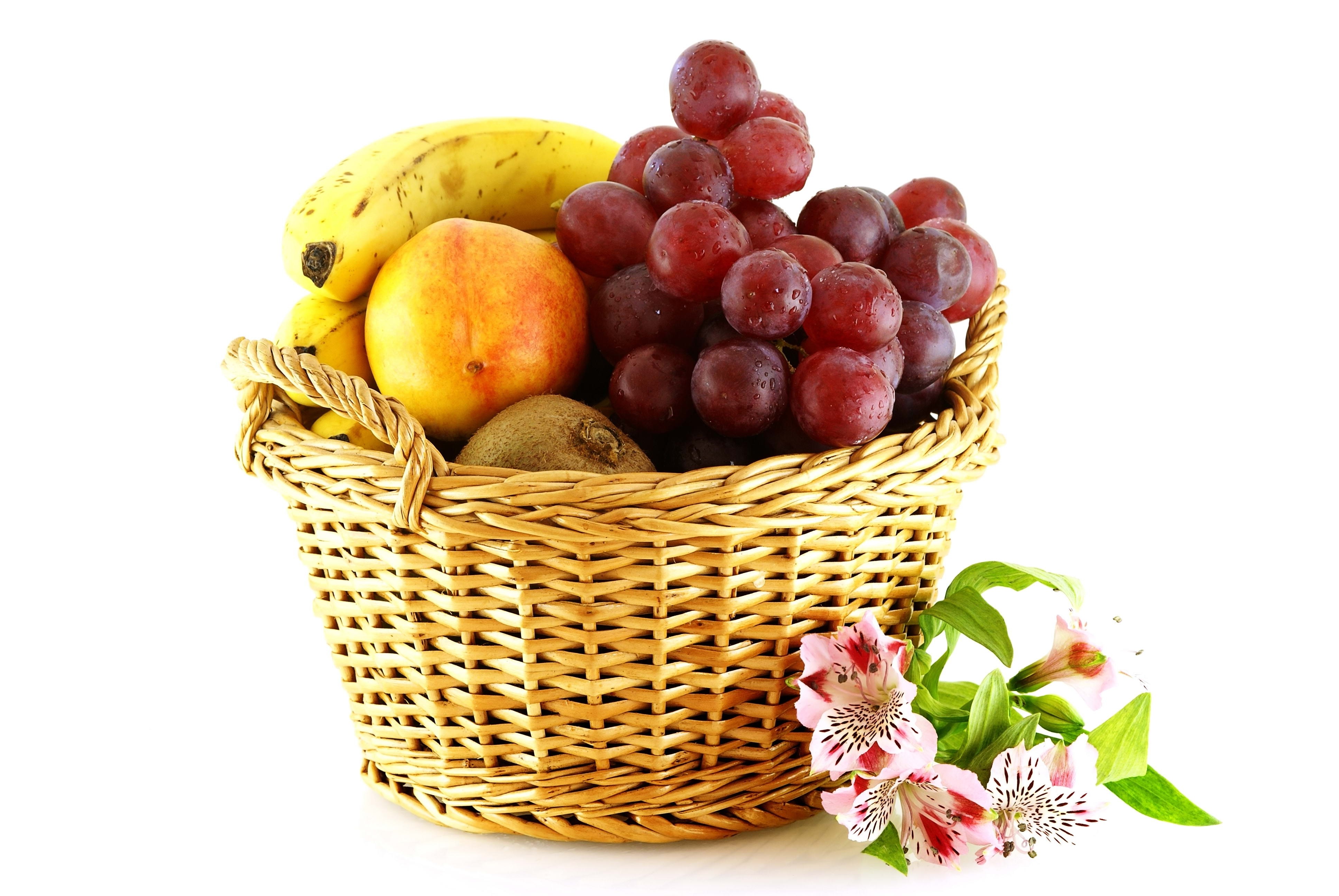 Fruit basket with grapes and flowers
