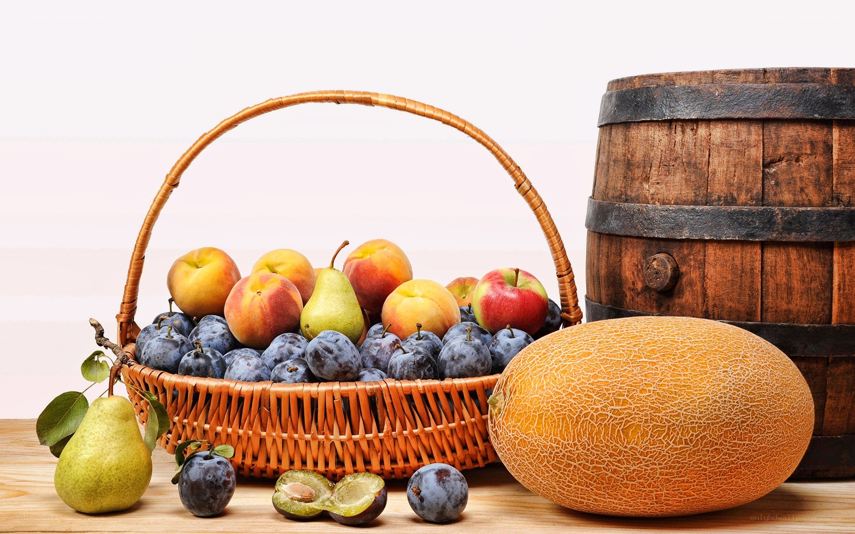 Fruit basket with melon and barrel