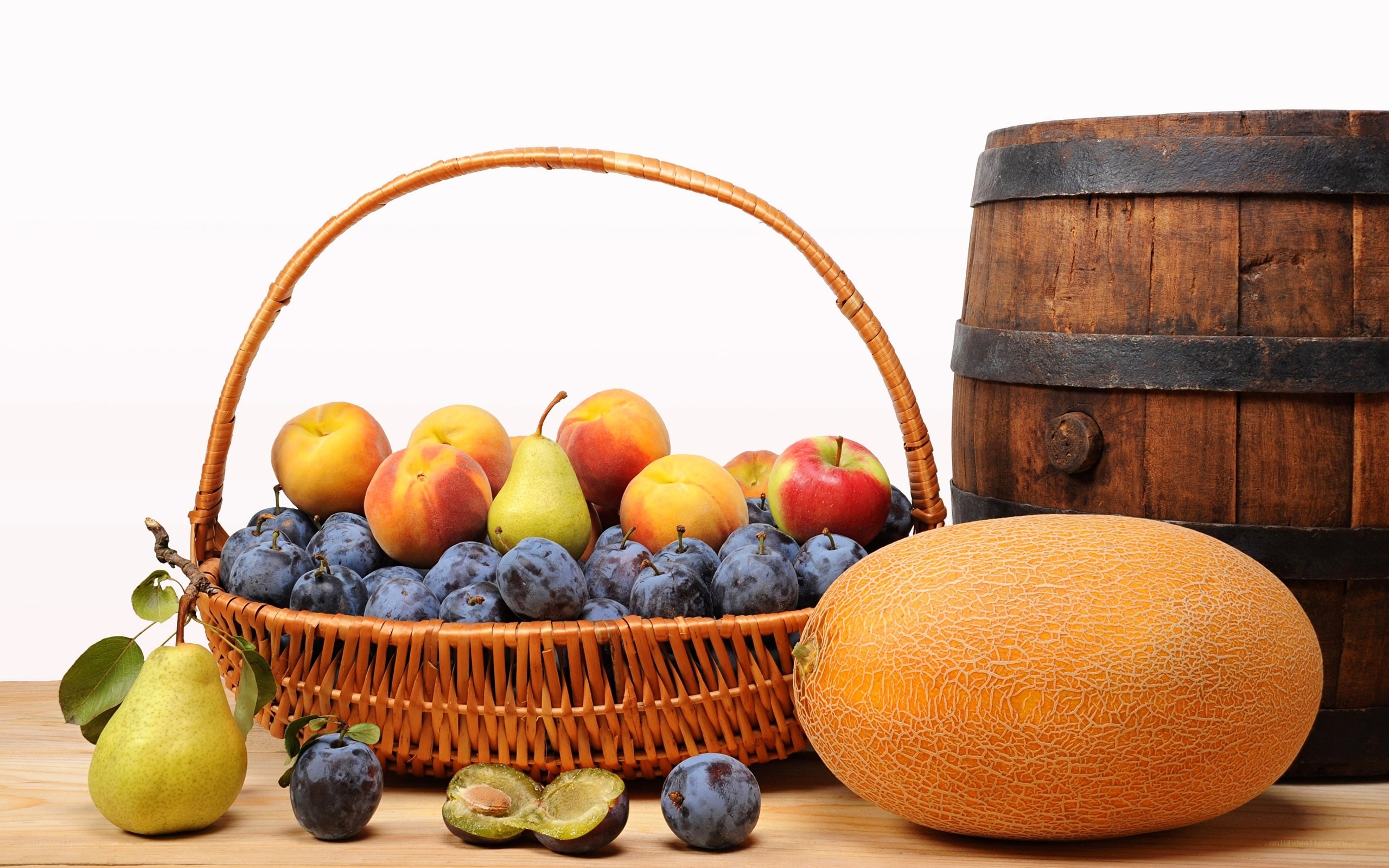 Fruit basket with melon and barrel