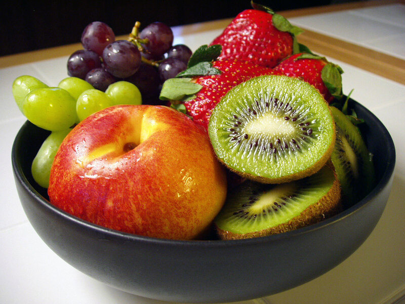 fruit bowl with kiwi and grapes