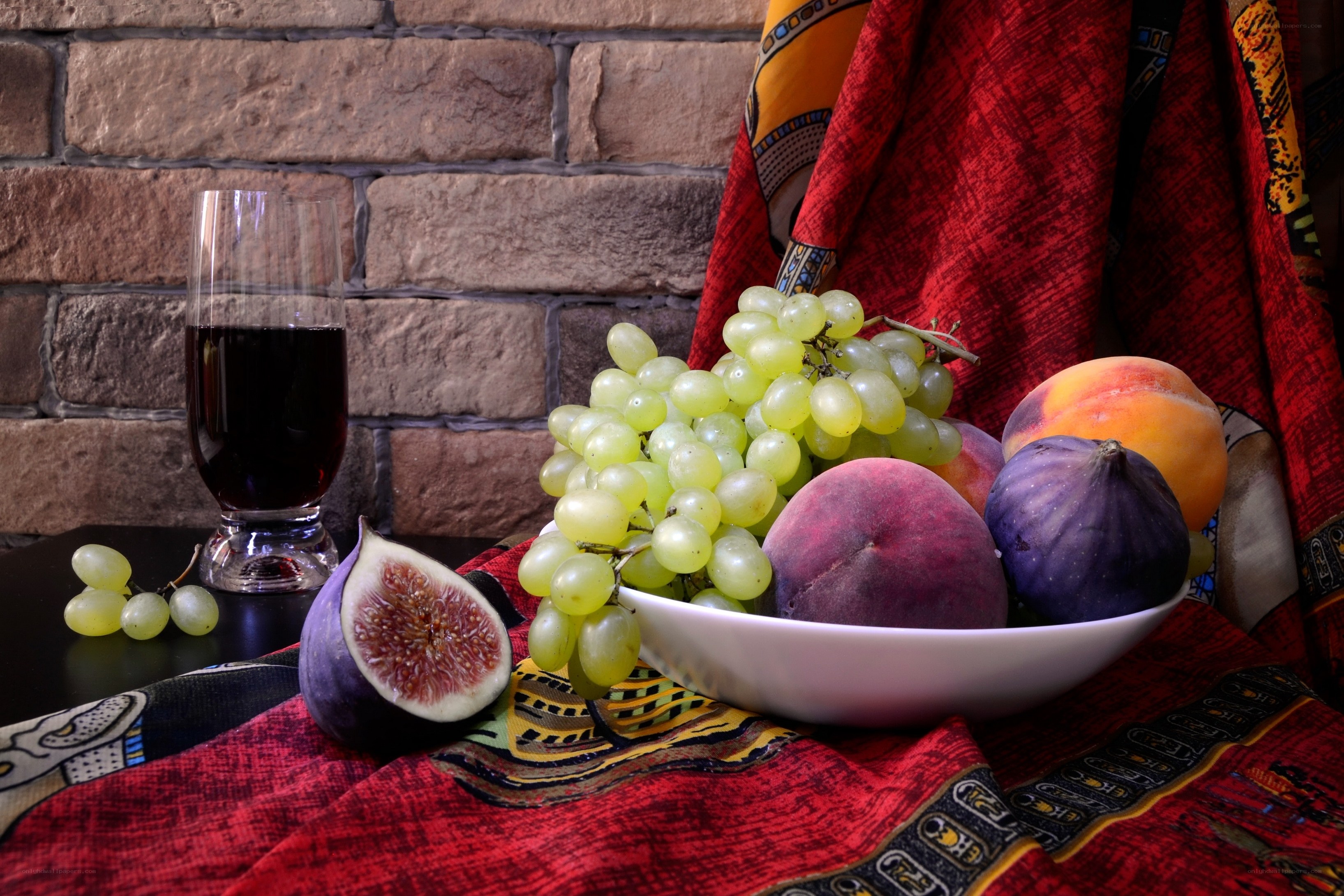 Fruit bowl with wine glass