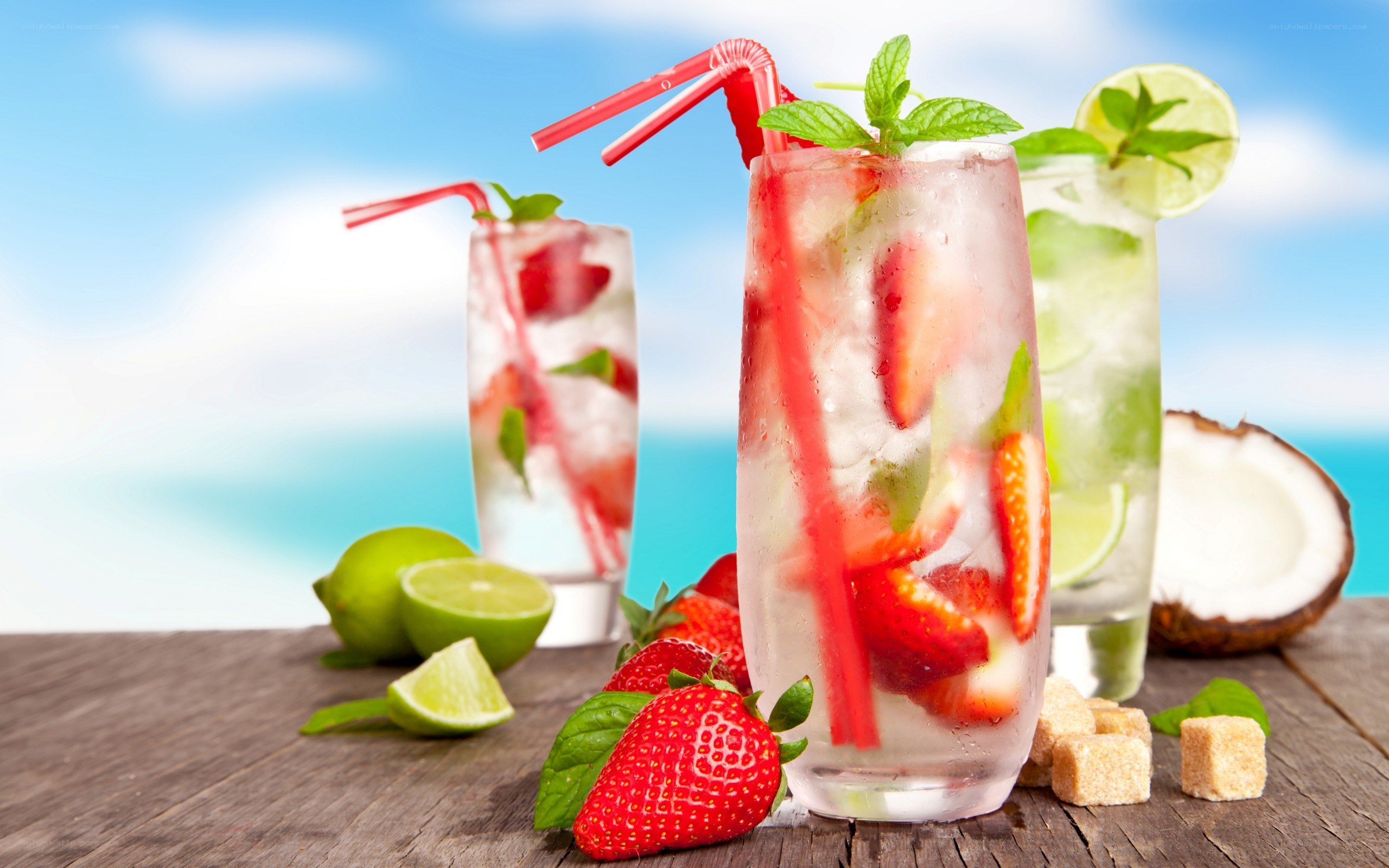 Fruit cocktails on a beach