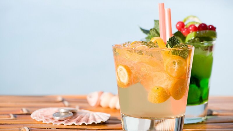 Fruit cocktails on a wooden table