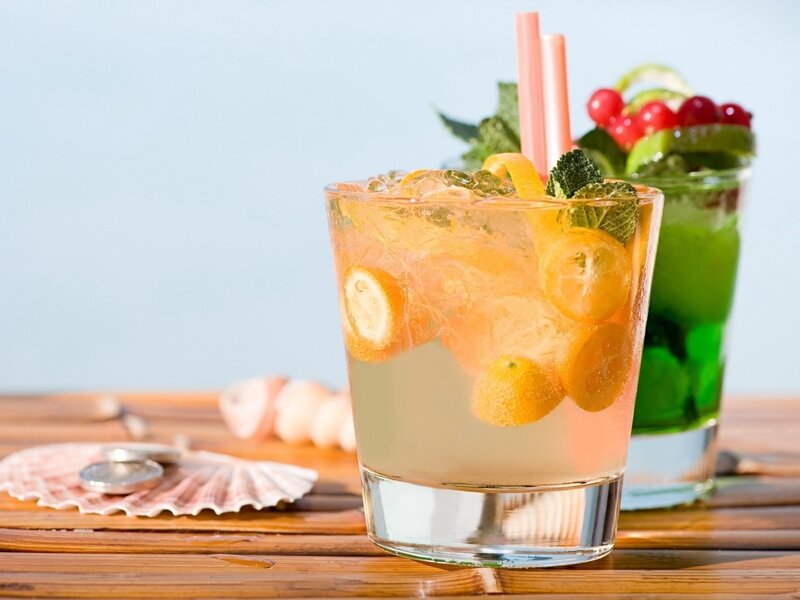 Fruit cocktails on a wooden table