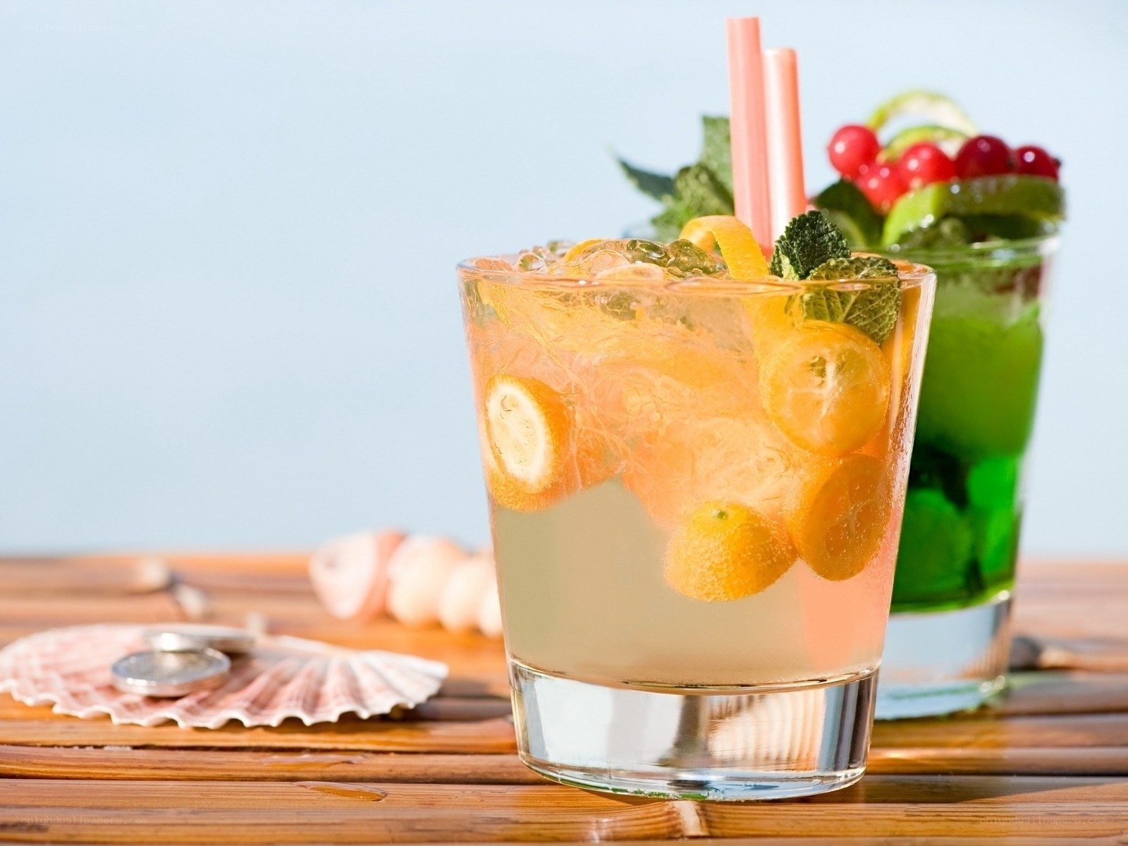 Fruit cocktails on a wooden table
